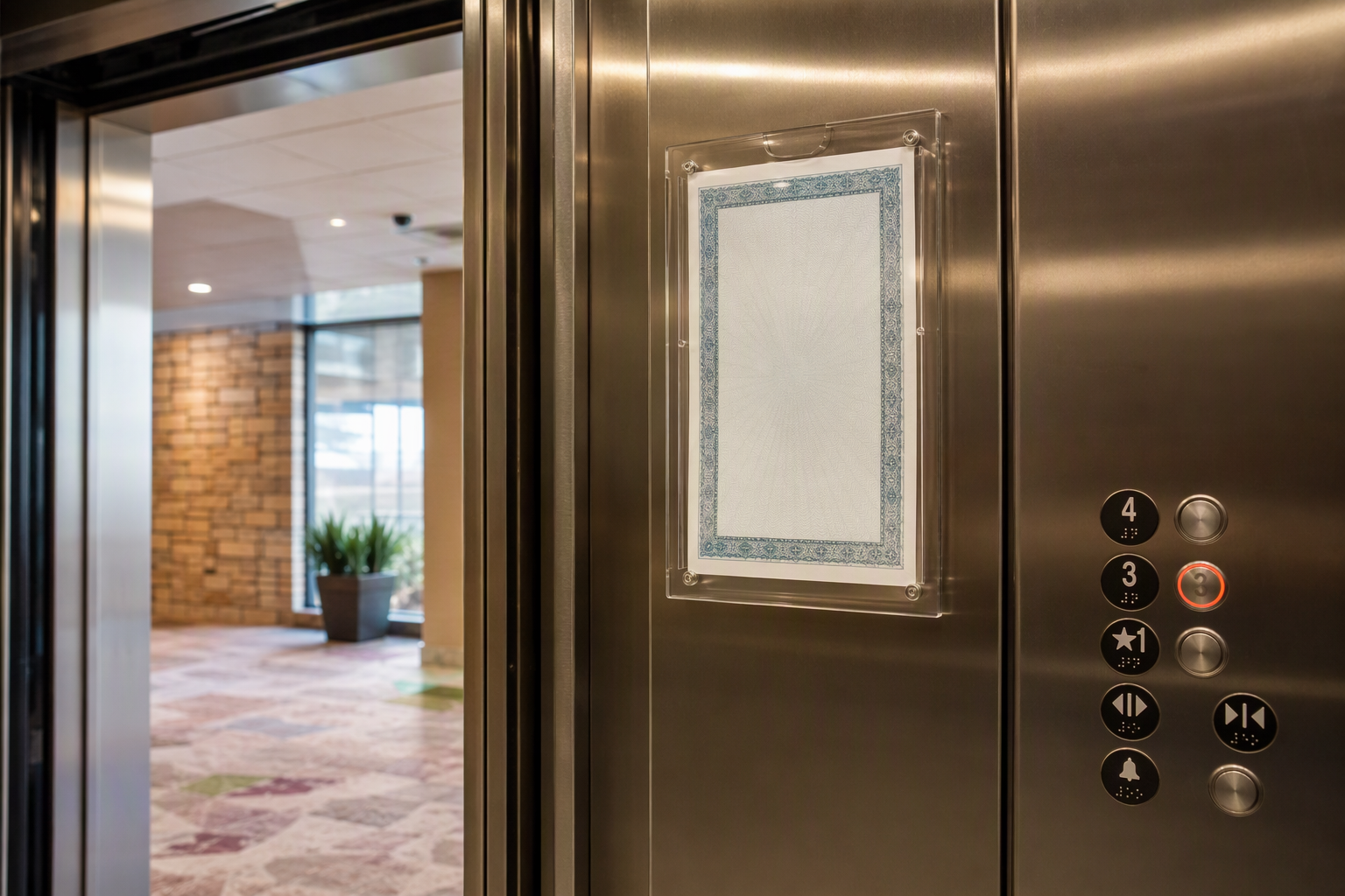 ADA-compliant elevator cab interior at a tribal public facility in Arizona displaying a required ICA certificate of inspection near the door, meeting state elevator compliance requirements.